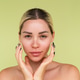 Beauty portrait of young topless woman with bare shoulders on green background with perfect skin and Beauty portrait of young topless woman with bare shoulders on green background with perfect skin and - PhotoDune Item for Sale