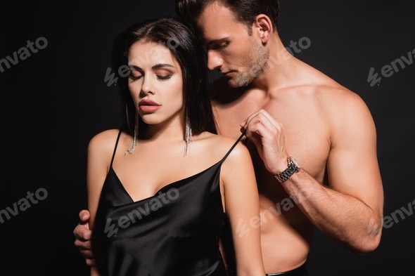 shirtless man undressing sexy woman in silk dress isolated on black Stock Photo by LightFieldStudios shirtless man undressing sexy woman in silk dress isolated on black Stock Photo by LightFieldStudios