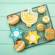 Celebrating Hanukkah. The concept of the Hanukkah holiday. Celebrating Hanukkah. The concept of the Hanukkah holiday. - PhotoDune Item for Sale