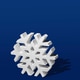 Three Dimensinoal Snowflake Ornament on a Navy Blue Background Three Dimensinoal Snowflake Ornament on a Navy Blue Background - PhotoDune Item for Sale