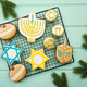 Celebrating Hanukkah. The concept of the Hanukkah holiday. Celebrating Hanukkah. The concept of the Hanukkah holiday. - PhotoDune Item for Sale