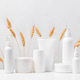 Cosmetic products on the table, white bottles and containers, mock-up scene Cosmetic products on the table, white bottles and containers, mock-up scene - PhotoDune Item for Sale