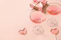 Festive champagne and two pink lollipops. Valentine's day greeting card. Festive champagne and two pink lollipops. Valentine's day greeting card. - PhotoDune Item for Sale