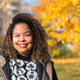 Brazilian woman smiling in autumn park in dresden Brazilian woman smiling in autumn park in dresden - PhotoDune Item for Sale