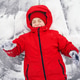 Child Making Snow Angel in Red Winter Coat During Snowy Day Child Making Snow Angel in Red Winter Coat During Snowy Day - PhotoDune Item for Sale