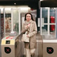 Portrait of a happy girl exiting the metro through a turnstile. Portrait of a happy girl exiting the metro through a turnstile. - PhotoDune Item for Sale
