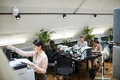 Young Businesswoman Printing Documents in Office Young Businesswoman Printing Documents in Office - PhotoDune Item for Sale