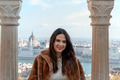 Portrait of happy young woman in front of cityscape of Budapest, Hungary Portrait of happy young woman in front of cityscape of Budapest, Hungary - PhotoDune Item for Sale