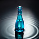 Glass bottle on water ripple surface Glass bottle on water ripple surface - PhotoDune Item for Sale