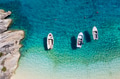 Mediterranean sea. Seascape with boats. Aerial view of floating boat on blue sea at sunny day. Mediterranean sea. Seascape with boats. Aerial view of floating boat on blue sea at sunny day. - PhotoDune Item for Sale