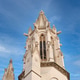 Historic stone church facade with ornate Gothic-style spires and gargoyles Historic stone church facade with ornate Gothic-style spires and gargoyles - PhotoDune Item for Sale