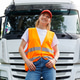 Portrait young adult happy smiling woman heavy truck driver modern cargo vehicle cabin background Portrait young adult happy smiling woman heavy truck driver modern cargo vehicle cabin background - PhotoDune Item for Sale