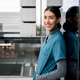 Confident female healthcare professional smiling outdoors Confident female healthcare professional smiling outdoors - PhotoDune Item for Sale