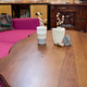 Wooden coffee table with ceramic vases and pink sofa in cozy living room Wooden coffee table with ceramic vases and pink sofa in cozy living room - PhotoDune Item for Sale