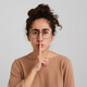 beautiful young woman student with bun of dark curly hair beautiful young woman student with bun of dark curly hair - PhotoDune Item for Sale