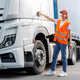 Portrait young adult happy smiling woman heavy truck driver modern cargo vehicle cabin background. Portrait young adult happy smiling woman heavy truck driver modern cargo vehicle cabin background. - PhotoDune Item for Sale