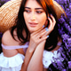 A woman in white dress and straw hat the lavender field on sunset. A woman in white dress and straw hat the lavender field on sunset. - PhotoDune Item for Sale