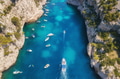 Yachts at the sea in France. Aerial view of luxury floating boat on transparent turquoise water Yachts at the sea in France. Aerial view of luxury floating boat on transparent turquoise water - PhotoDune Item for Sale
