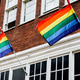 Rainbow flags in Amsterdam. LGBTQ. Love. Equality. Rainbow flags in Amsterdam. LGBTQ. Love. Equality. - PhotoDune Item for Sale