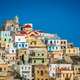 Hillside colorful homes in the old tradition village Olympos Hillside colorful homes in the old tradition village Olympos - PhotoDune Item for Sale