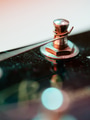 Macro tuning peg of an electric guitar Macro tuning peg of an electric guitar - PhotoDune Item for Sale