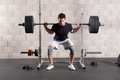 Man performing a crossfit back squat exercise Man performing a crossfit back squat exercise - PhotoDune Item for Sale