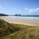 Holywell Bay and beach, Cornwall, UK. Coastal beach with sand dunes Holywell Bay and beach, Cornwall, UK. Coastal beach with sand dunes - PhotoDune Item for Sale