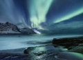 Aurora borealis on Lofoten islands, Norway. Green northern lights above mountains. Aurora borealis on Lofoten islands, Norway. Green northern lights above mountains. - PhotoDune Item for Sale