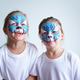 Two sister girls with aqua makeup in the form of a blue water zodiac tiger Two sister girls with aqua makeup in the form of a blue water zodiac tiger - PhotoDune Item for Sale