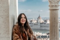 Portrait of happy young woman in front of cityscape of Budapest, Hungary Portrait of happy young woman in front of cityscape of Budapest, Hungary - PhotoDune Item for Sale