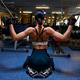 Athletic woman in the gym showing muscles Athletic woman in the gym showing muscles - PhotoDune Item for Sale