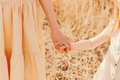 Holding hands above wheat field. Spring summer season. Care and support concept Holding hands above wheat field. Spring summer season. Care and support concept - PhotoDune Item for Sale