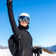 Portrait young adult happy smiling woman skier wear black outfit overall stand snowy slope Portrait young adult happy smiling woman skier wear black outfit overall stand snowy slope - PhotoDune Item for Sale