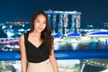 Beautiful Asian women smile and happy with singapore city view Beautiful Asian women smile and happy with singapore city view - PhotoDune Item for Sale
