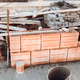 industrial bricklayer installing bricks on construction site industrial bricklayer installing bricks on construction site - PhotoDune Item for Sale