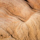 Sandstone surface eroded rock cliff textured natural background Sandstone surface eroded rock cliff textured natural background - PhotoDune Item for Sale