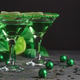 Green Cocktails with Lime, Gifts and Confetti. Festive St. Patricks Day Celebration Still Life Green Cocktails with Lime, Gifts and Confetti. Festive St. Patricks Day Celebration Still Life - PhotoDune Item for Sale
