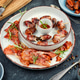A plate of bacon wrapped dates. A plate of bacon wrapped dates. - PhotoDune Item for Sale