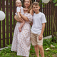 beautiful young mother in a summer dress and two sons, an adult and a one-year-old baby in the beautiful young mother in a summer dress and two sons, an adult and a one-year-old baby in the - PhotoDune Item for Sale