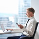 Busy professional young business man executive working in modern office. Busy professional young business man executive working in modern office. - PhotoDune Item for Sale