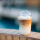 Glass of iced coffee in coffee shop, copy space concept. Glass of iced coffee in coffee shop, copy space concept. - PhotoDune Item for Sale