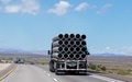 Big Rig Semi Truck Hauling Large Metal Pipe! Big Rig Semi Truck Hauling Large Metal Pipe! - PhotoDune Item for Sale