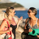 Two Female Friends Meet Outdoors To Do Some Yoga Exercise Together Two Female Friends Meet Outdoors To Do Some Yoga Exercise Together - PhotoDune Item for Sale