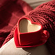 Heart Shaped Coffee Cup on Armchair with Red Blanket. Cozy Valentines Day Still Life Heart Shaped Coffee Cup on Armchair with Red Blanket. Cozy Valentines Day Still Life - PhotoDune Item for Sale