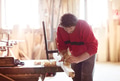 Carpenter working with plane Carpenter working with plane - PhotoDune Item for Sale