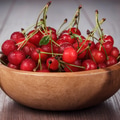 Wooden Bowl Full Of Cherries On Table Wooden Bowl Full Of Cherries On Table - PhotoDune Item for Sale