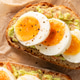 Avocado Toast with Soft Boiled Eggs and Black Pepper on Crusty Bread Avocado Toast with Soft Boiled Eggs and Black Pepper on Crusty Bread - PhotoDune Item for Sale