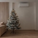 Cozy Living Room with Decorated Christmas Tree and Festive Interior Cozy Living Room with Decorated Christmas Tree and Festive Interior - PhotoDune Item for Sale