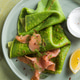 Green pancakes. Round thin green spinach crepe pancakes with smoke salmon and souce creame Green pancakes. Round thin green spinach crepe pancakes with smoke salmon and souce creame - PhotoDune Item for Sale