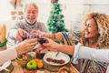 Group of people cheeful family have fun all together enjoying Christmas lunch at home Group of people cheeful family have fun all together enjoying Christmas lunch at home - PhotoDune Item for Sale